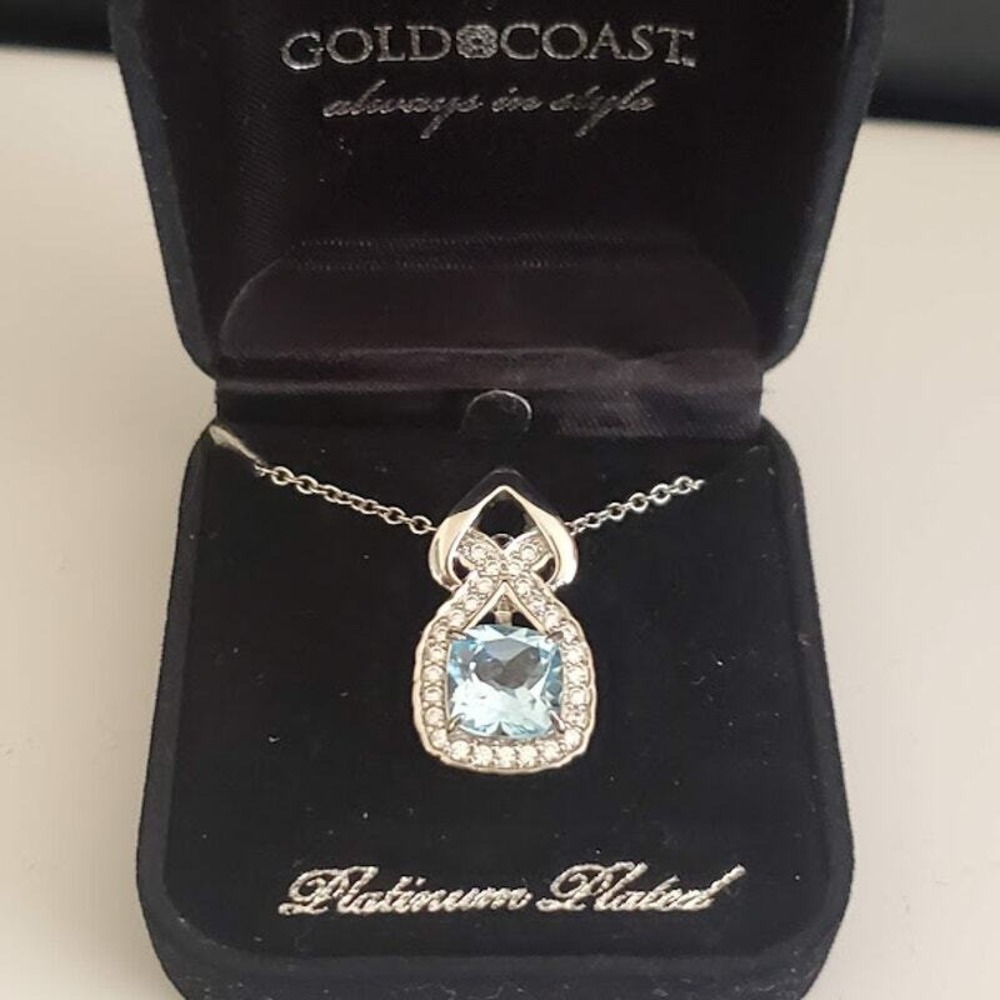 Gold Coast Platinum Plated Cushion Cut Faux Aquamarine Halo Pendant Necklace